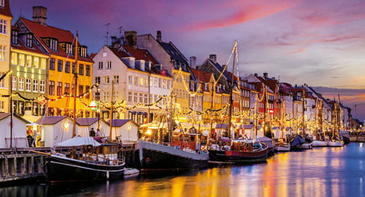 Christmas lights illuminating the canals of Nyhavn in Copenhagen, Denmark Christmas lights illuminating the canals of Nyhavn in Copenhagen, Denmark