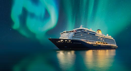Spirit of Discovery sailing under the Northern Lights, Norway