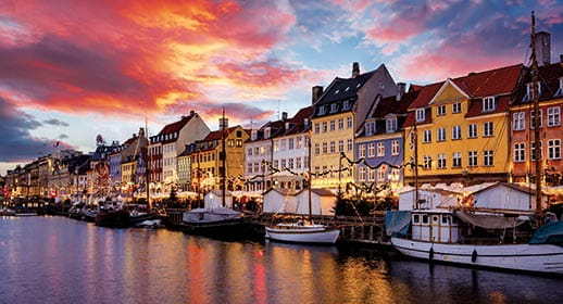 The Nyhavn District of Copenhagen illuminated with Christmas lights The Nyhavn District of Copenhagen illuminated with Christmas lights