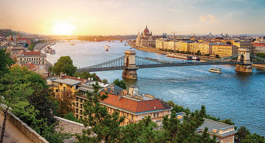 A view over Budapest on the Danube river at sunset, Hungary A view over Budapest on the Danube river at sunset, Hungary