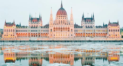 Budapest's Parliament Building on the banks of the Danube river in winter Budapest's Parliament Building on the banks of the Danube river in winter