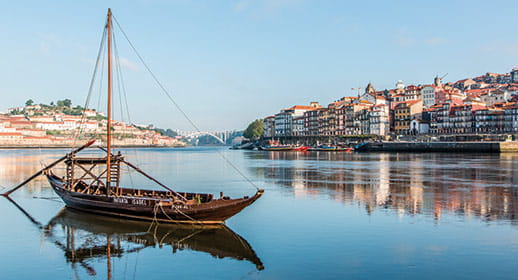 A Rabelo boat on the Douro River in Oporto, Portugal A Rabelo boat on the Douro River in Oporto, Portugal