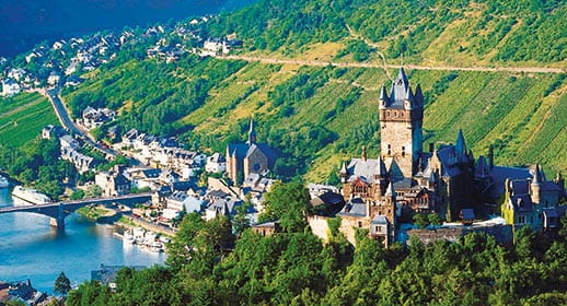 Reichsburg Castle in Cochem, overlooking the Moselle river Reichsburg Castle in Cochem, overlooking the Moselle river