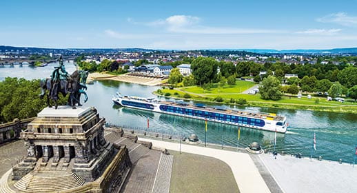 Spirit of the Rhine sailing past Deutches Eck in Koblenz, Germany Spirit of the Rhine sailing past Deutches Eck in Koblenz, Germany