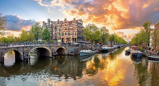 Amsterdam's canals at sunset, Netherlands Amsterdam's canals at sunset, Netherlands
