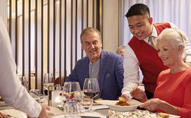 People dining in the Amalfi restaurant on Spirit of Adventure