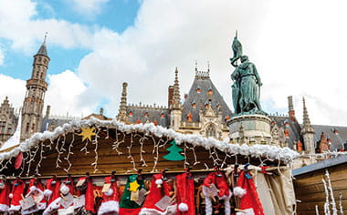 A Christmas market in the town square in Bruges, Belgium