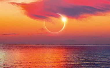 A solar eclipse over the ocean