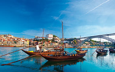 Boats on he Douro River that runs through Oporto