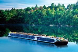 Spirit of the Moselle sailing beside a forest