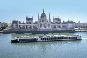 Spirit of the Danube cruising past Budapest Parliament building