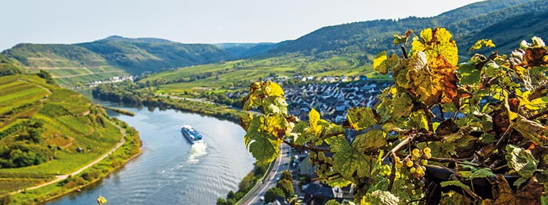 A river ship sailing along the Moselle in Germany