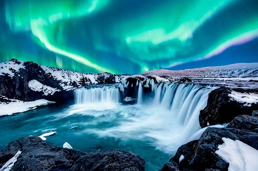 The Northernm Lights over Godafoss Falls