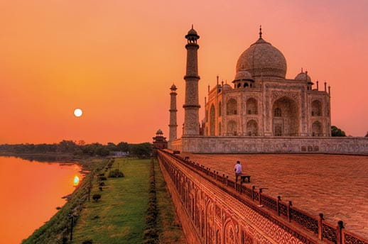 An orange sky over the Taj Mahal